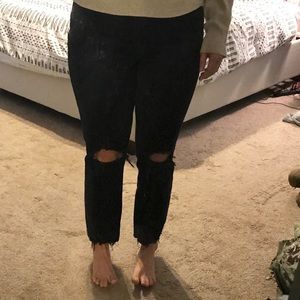 Higher-rise distressed mom jeans